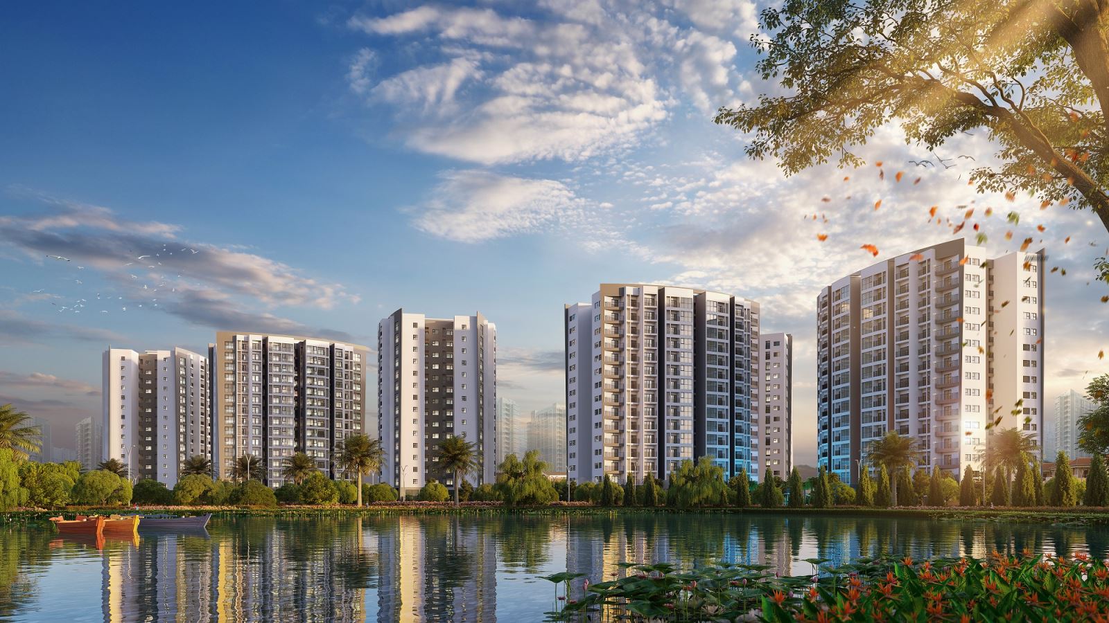 A group of buildings next to a body of waterDescription automatically generated