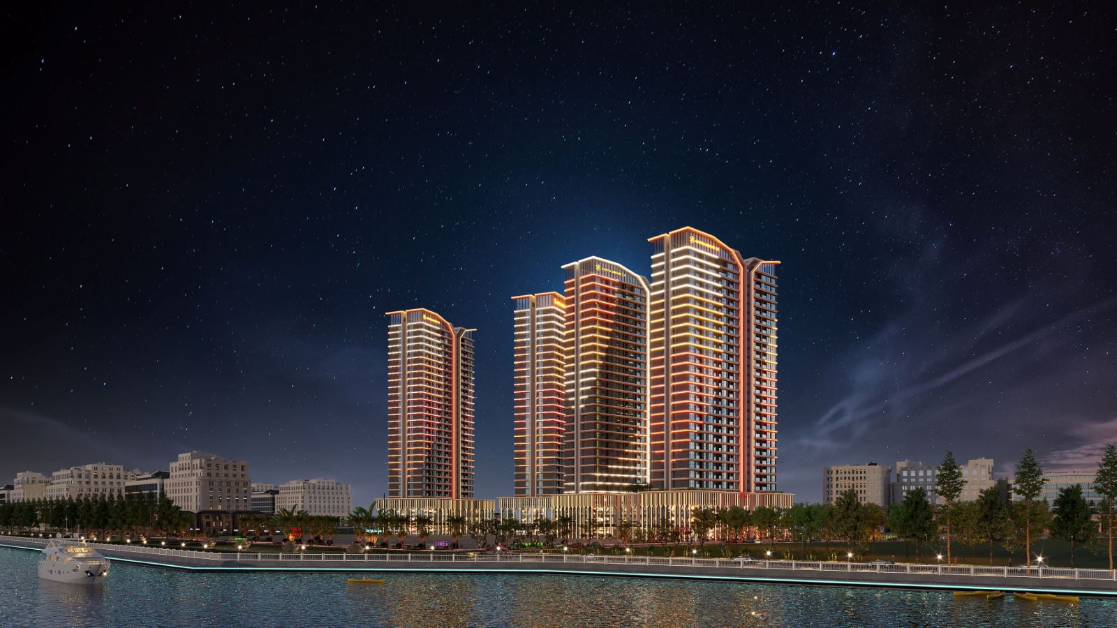 A group of buildings lit up at nightDescription automatically generated