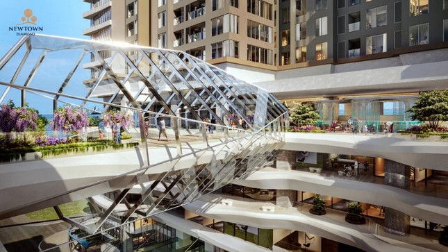 A glass walkway over a buildingDescription automatically generated